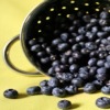 blueberries spilling from basket