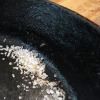cleaning cast iron skillet with salt