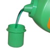pouring green laundry detergent