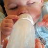 baby drinking from bottle
