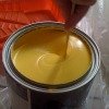 yellow paint in can
