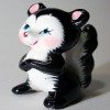 skunk figurine