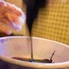 pouring hair dye in bowl