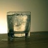 water glass sitting on wood table