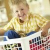 boy in laundry basket