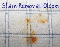 Spaghetti sauce stain on dish towel, plus instructions for how to remove it {on Stain Removal 101}