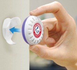 placing Munchkin Arm & Hammer nursery freshener in bracket